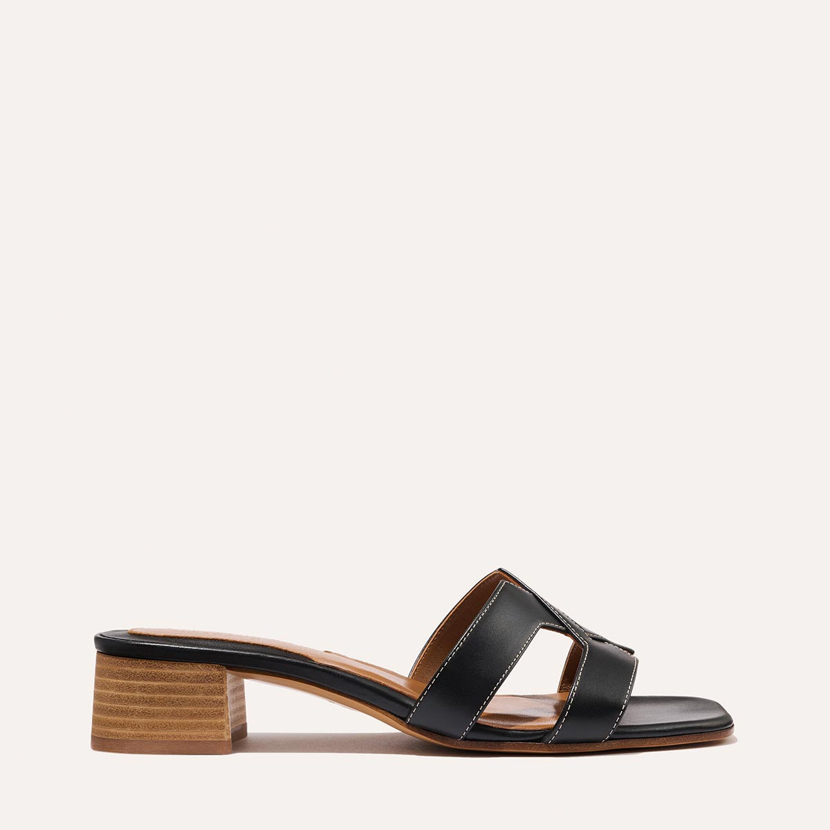 Margaux's classic and comfortable MX 35 Sandal, made in Spain from black Italian calf leather with a walkable 1" block heel.