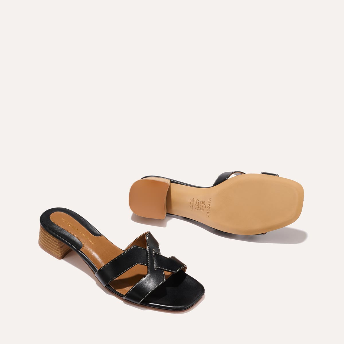 Margaux's classic and comfortable MX 35 Sandal, made in Spain from black Italian calf leather with a walkable 1" block heel.