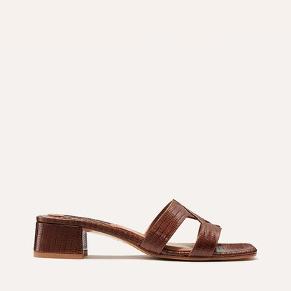 The MX 35 in Brown Lizard, a slip-on sandal with structured straps, a subtly square toe and a comfortable 1.5-inch block heel.