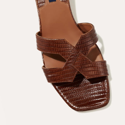 The MX 35 in Brown Lizard, a slip-on sandal with structured straps, a subtly square toe and a comfortable 1.5-inch block heel.