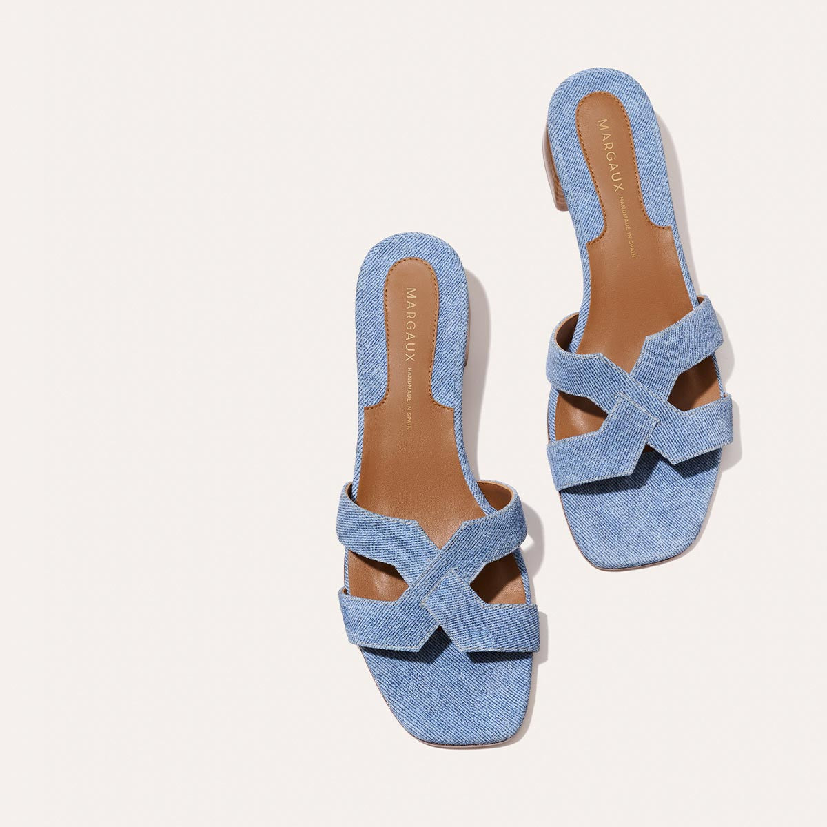 Margaux's classic and comfortable MX 35 Sandal, made in Spain from denim blue Italian suede leather with a walkable block heel