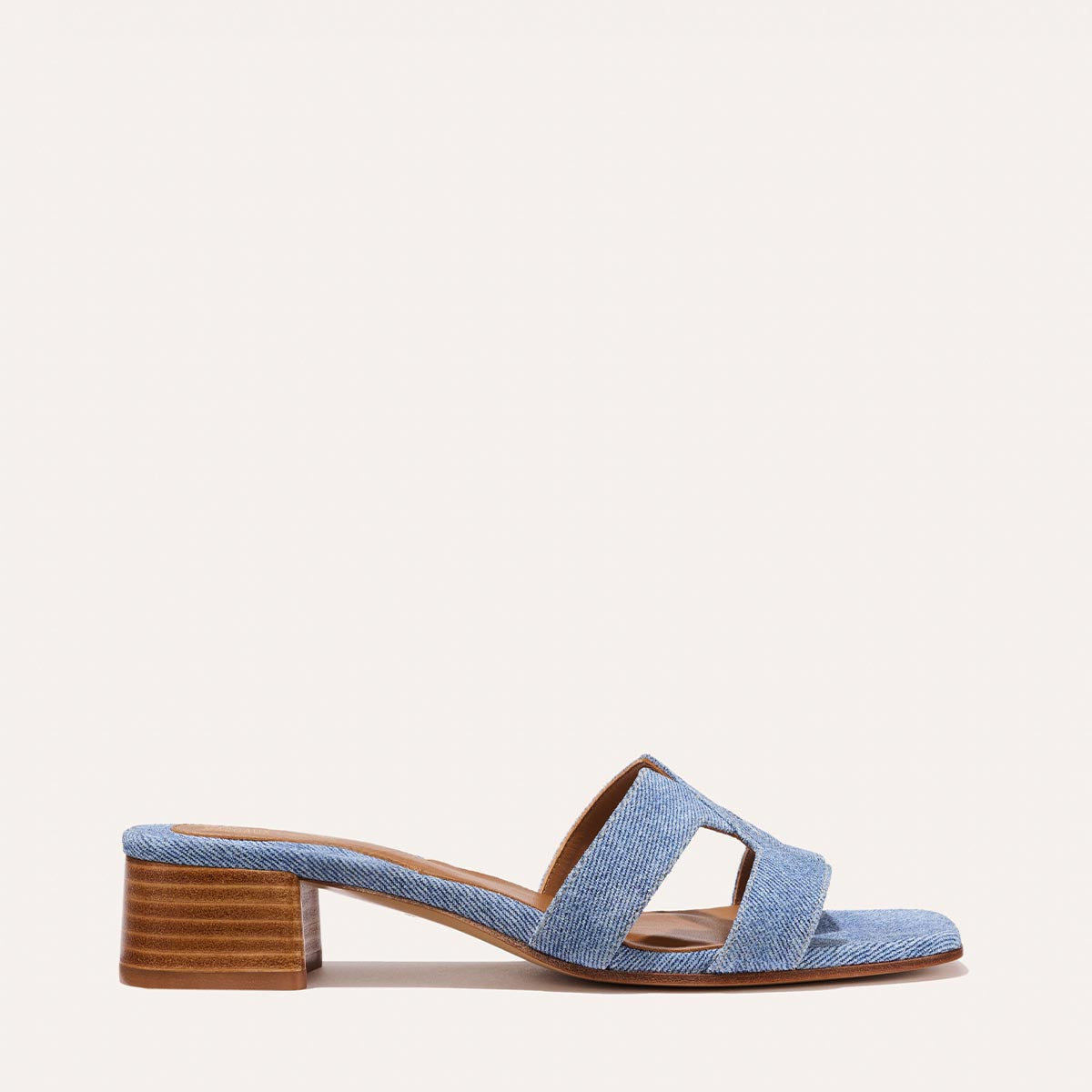 Margaux's classic and comfortable MX 35 Sandal, made in Spain from denim blue Italian suede leather with a walkable block heel