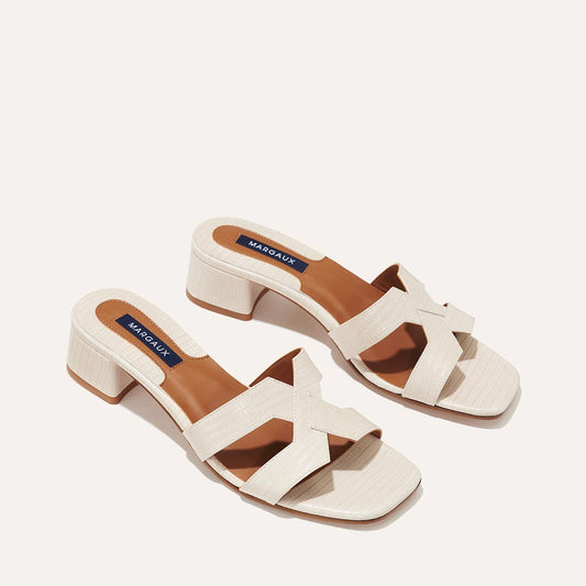 Margaux's classic and comfortable MX 35 Sandal, made in Spain from ecru lizard-embossed Italian leather with a walkable block heel