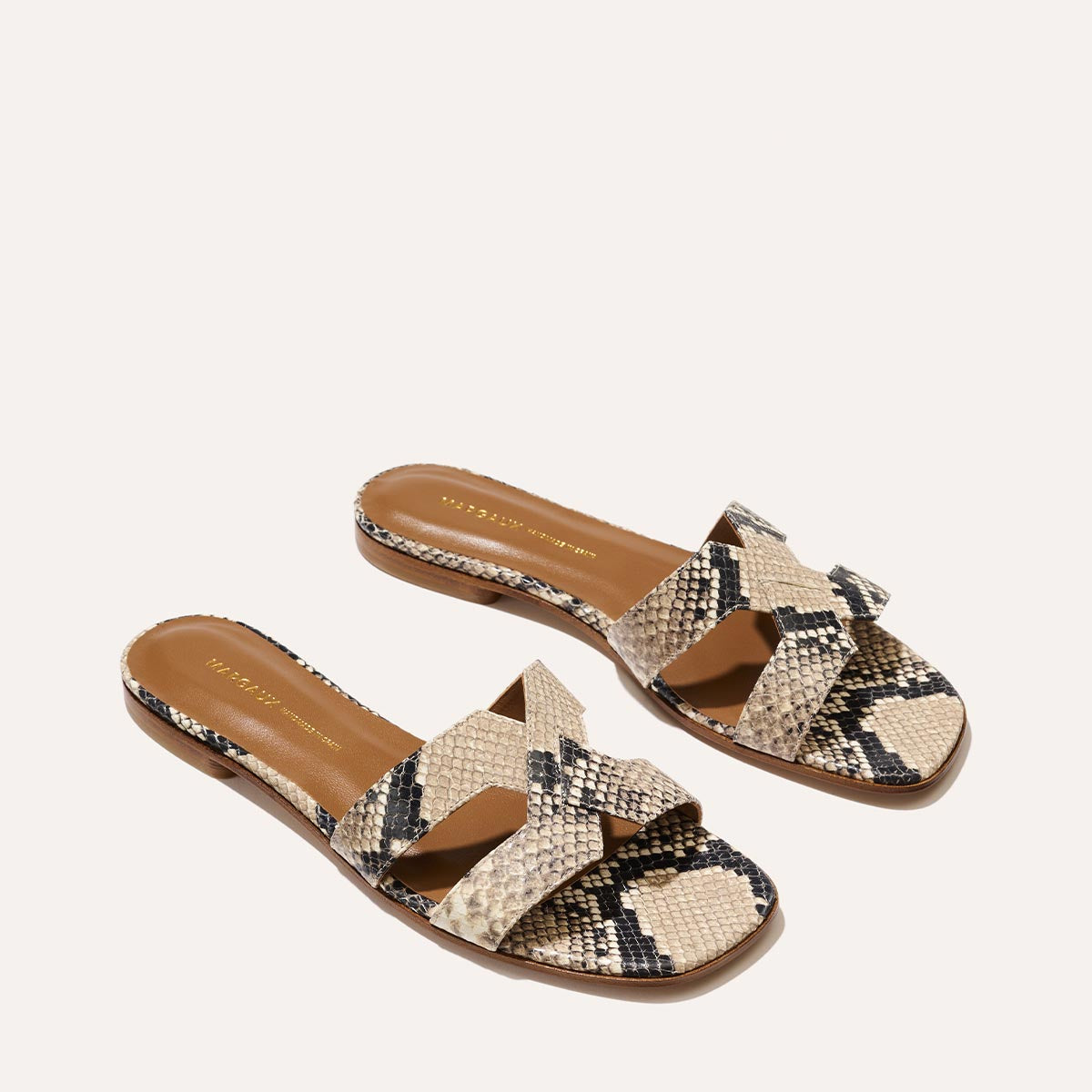 The MX Sandal in Natural Python Embossed, a slip-on sandal featuring embossed Italian leather with structured straps and a subtly square toe.