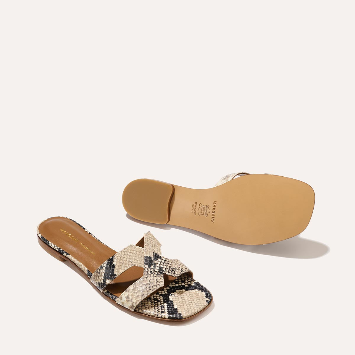 The MX Sandal in Natural Python Embossed, a slip-on sandal featuring embossed Italian leather with structured straps and a subtly square toe.