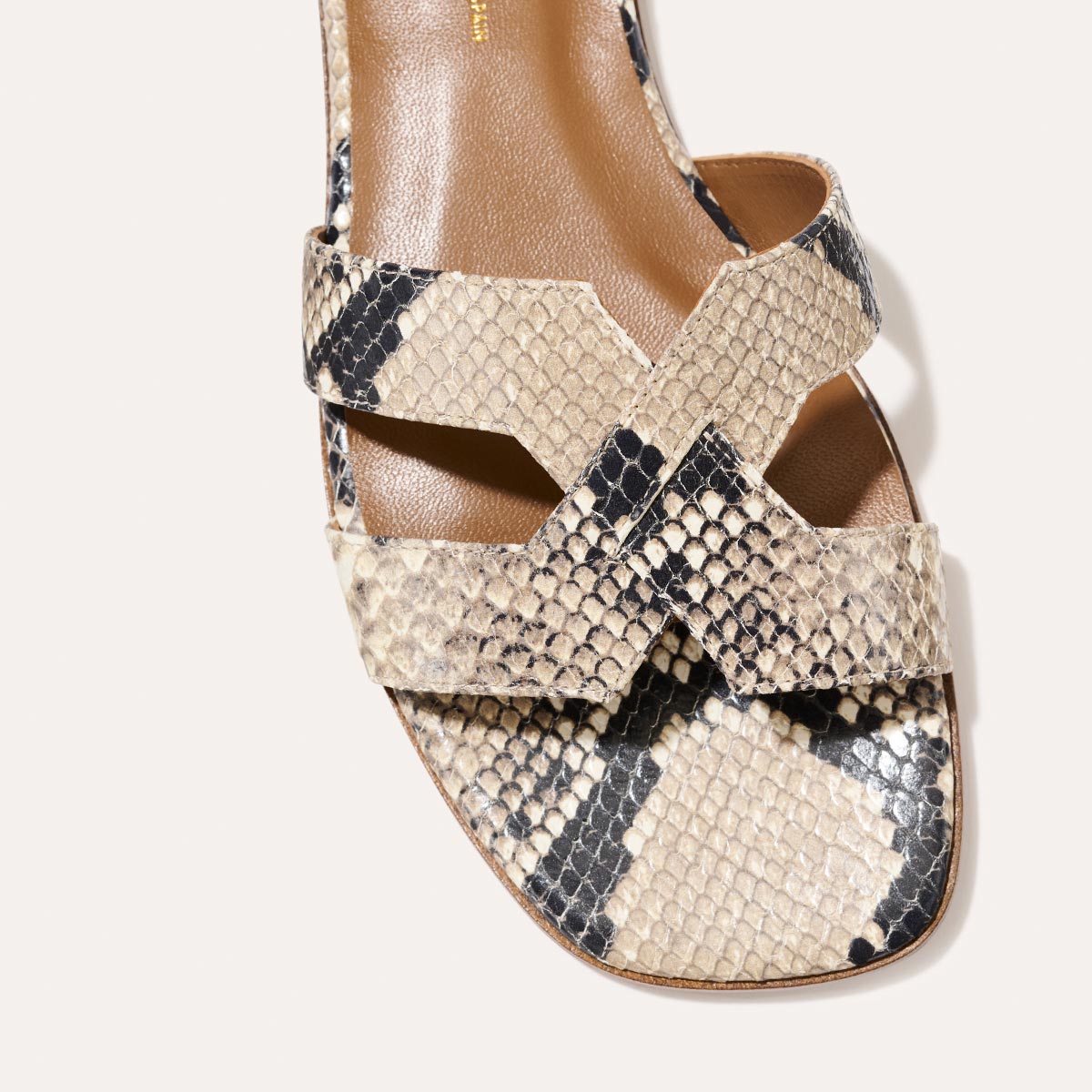 The MX Sandal in Natural Python Embossed, a slip-on sandal featuring embossed Italian leather with structured straps and a subtly square toe.