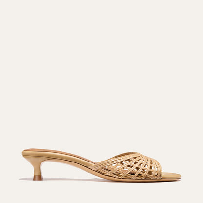 Beige woven sandal on a white background