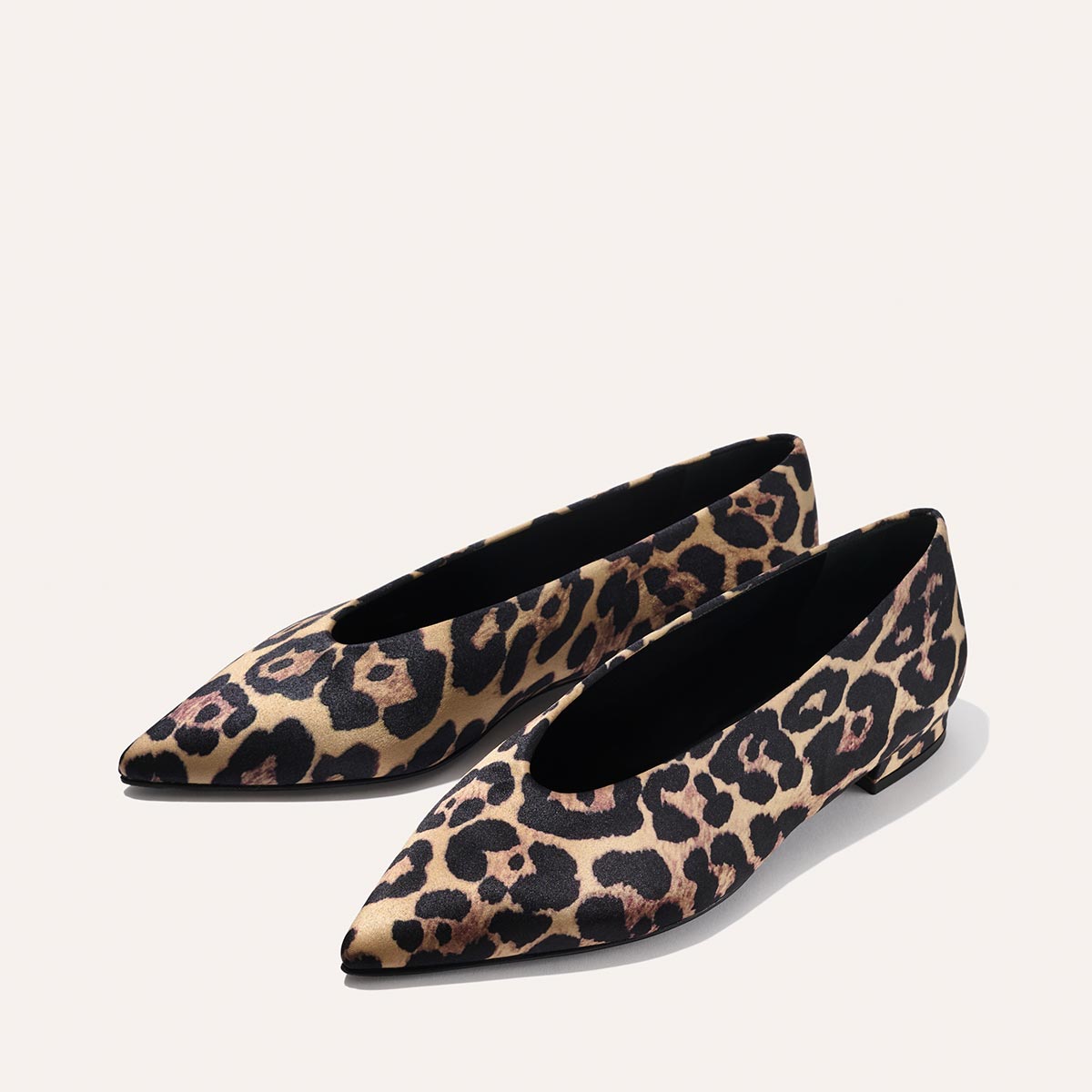 The Parra - Leopard Satin by margaux-development: pointed-toe flats in a leopard print, shown on a neutral background.