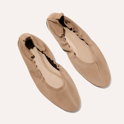The Pascale - Cameo Suede by Margaux: tan suede ballet flats with gathered elastic edges and a minimalist design, shown on a light background.