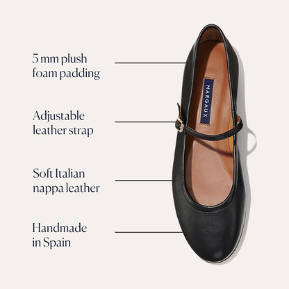 The Demi Jane - Black Nappa by margaux-development is a black Italian nappa leather flat with an adjustable buckle strap, 5 mm plush foam padding, and elegant femininity, all handcrafted in Spain.