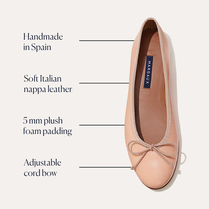 The Demi - Ballet Pink Nappa by margaux-development is a blush ballet flat handmade in Spain from Italian nappa leather, featuring 5mm plush foam padding and an adjustable cord bow for comfort.