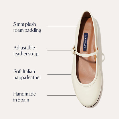 The Demi Jane - Ecru Nappa by margaux-development is a cream Mary Jane flat featuring soft Italian nappa leather, a 5mm plush foam footbed, an adjustable strap, and handmade Spanish craftsmanship for timeless elegance.