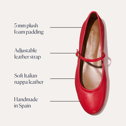 A top view of Margauxs Demi Jane - Scarlet Nappa flat features 5 mm plush foam padding, an adjustable leather strap, soft Italian nappa leather, and expert handmade construction in Spain for an elegant feminine look.