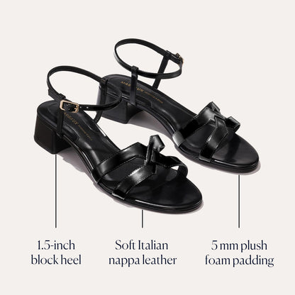 The Yves - Black Calf by margaux-development: elegant black strappy sandals with a 1.5-inch block heel, crafted from soft Italian nappa leather and featuring 5 mm plush foam padding for comfort.