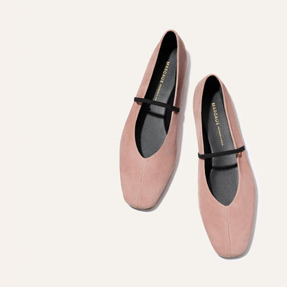 The Phoebe - Dusty Rose Suede by margaux-development: blush pink suede ballet flats with black insoles and a thin black strap, crafted with sacchetto construction for comfort, shown on a light background.