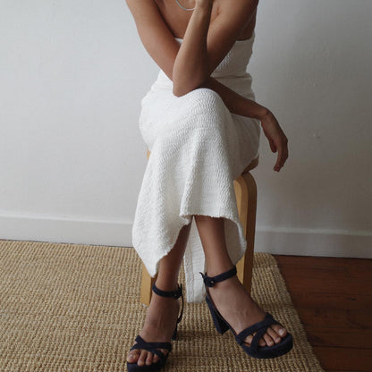 The Platform Sandal in Midnight Suede, featuring a sleek ankle strap, perfectly placed straps across the toes and a comfortable 3.5-inch block heel.