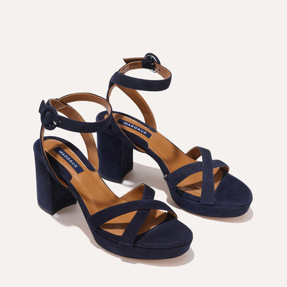 The Platform Sandal in Midnight Suede, featuring a sleek ankle strap, perfectly placed straps across the toes and a comfortable 3.5-inch block heel.
