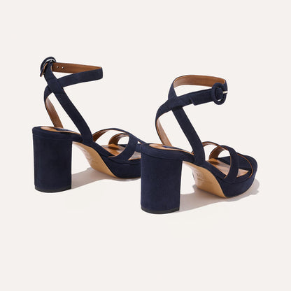 The Platform Sandal in Midnight Suede, featuring a sleek ankle strap, perfectly placed straps across the toes and a comfortable 3.5-inch block heel.