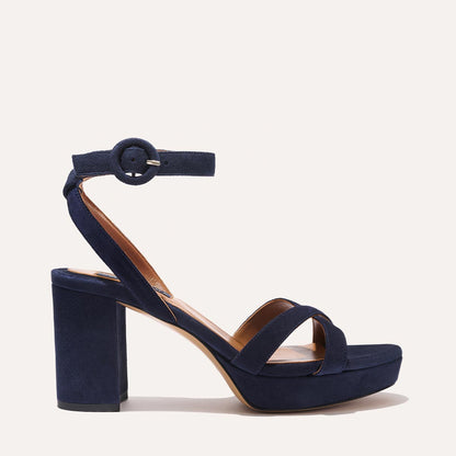 The Platform Sandal in Midnight Suede, featuring a sleek ankle strap, perfectly placed straps across the toes and a comfortable 3.5-inch block heel.