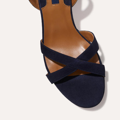 The Platform Sandal in Midnight Suede, featuring a sleek ankle strap, perfectly placed straps across the toes and a comfortable 3.5-inch block heel.