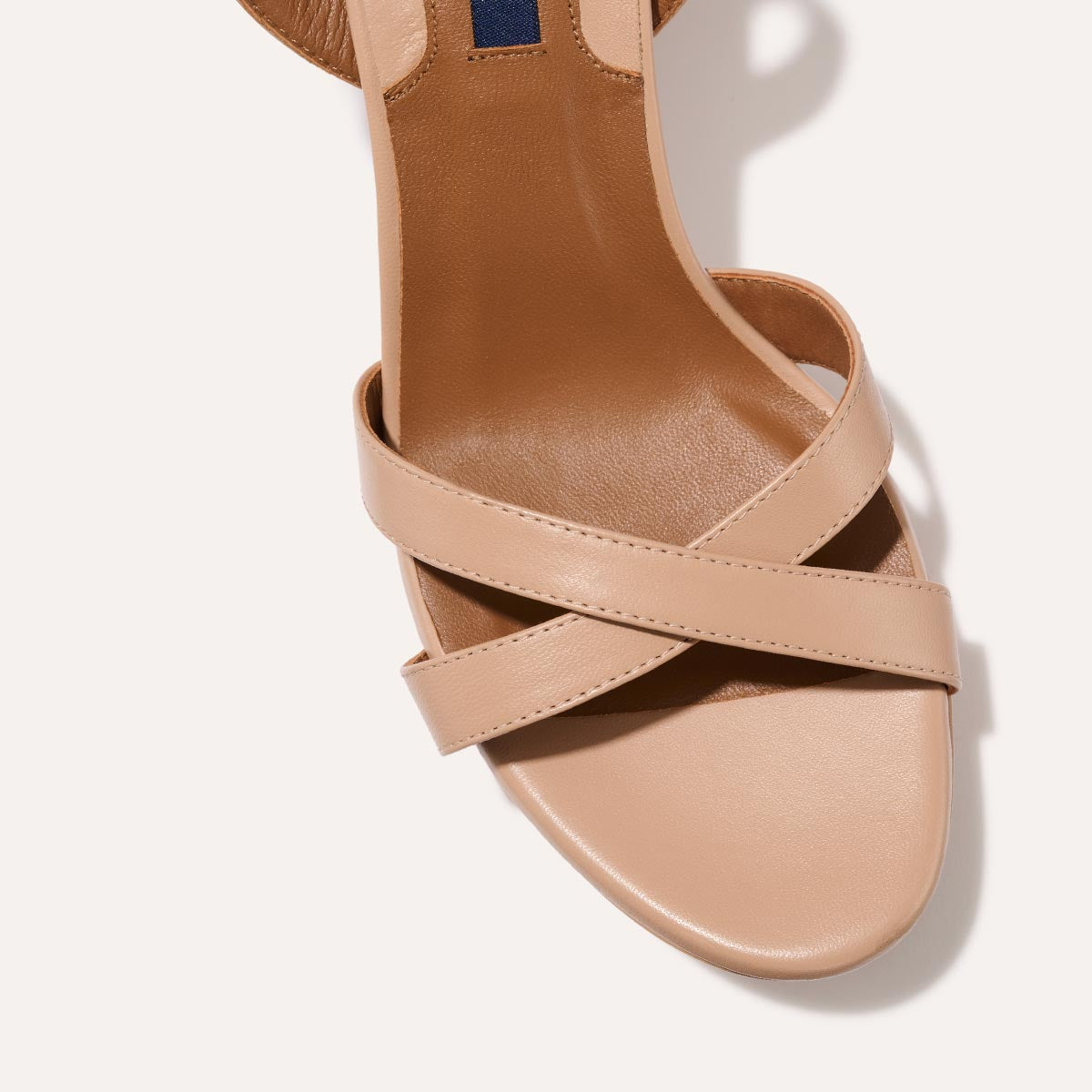 The Platform Sandal in Rose Nappa, featuring a sleek ankle strap, perfectly placed straps across the toes and a comfortable 3.5-inch block heel.