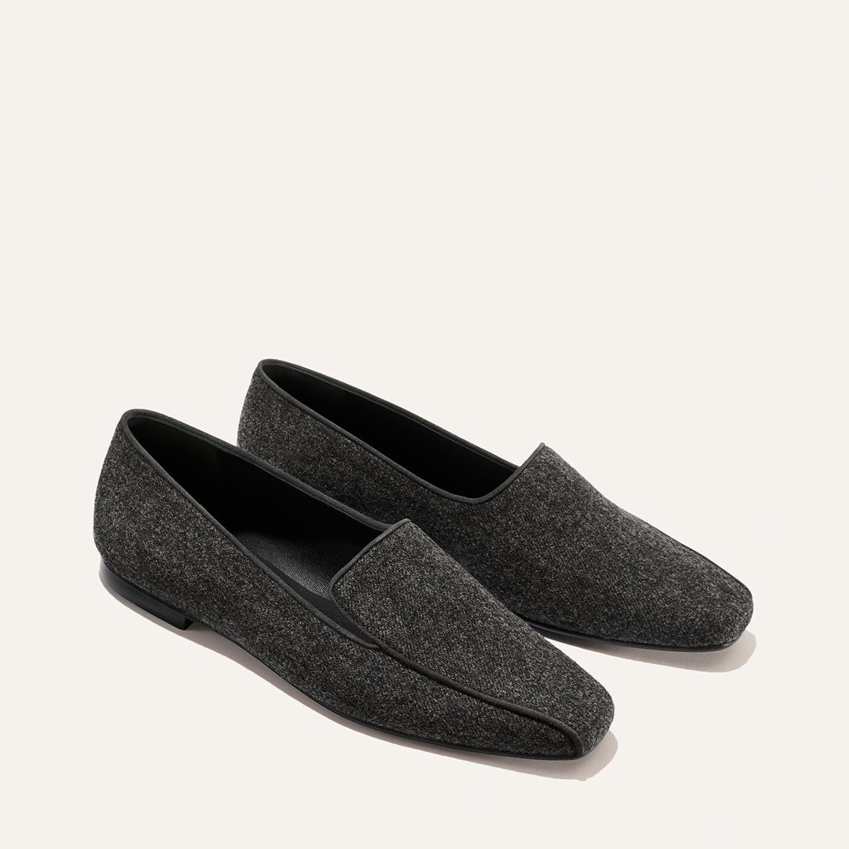 Margaux The Portia Loafer - Grey Flannel with black piping and a square toe.