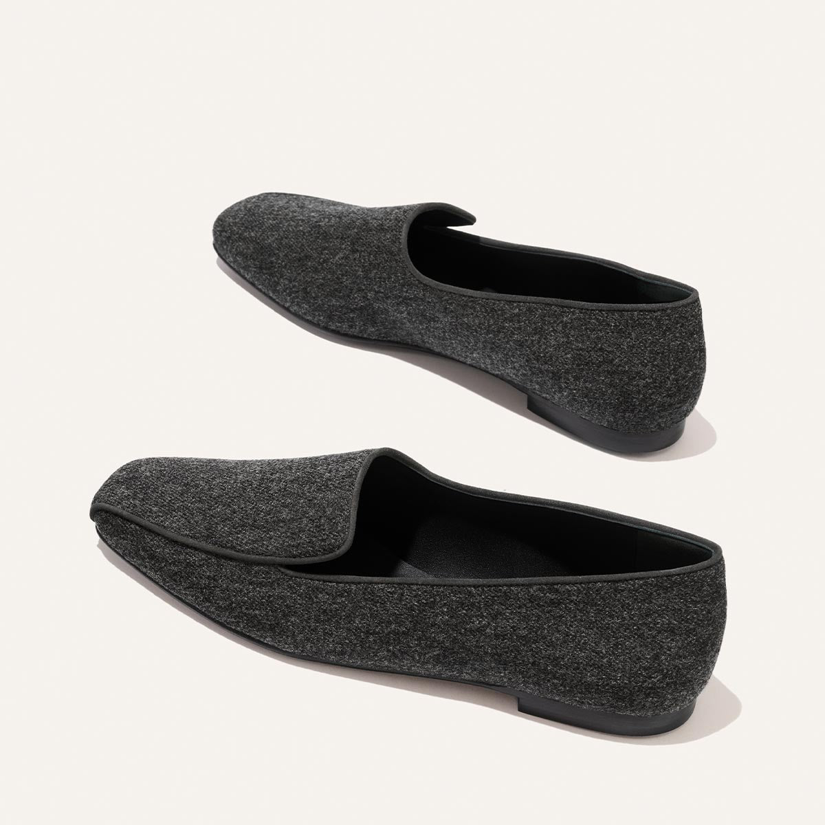 Margaux The Portia Loafer - Grey Flannel loafers with black trim and a low heel.