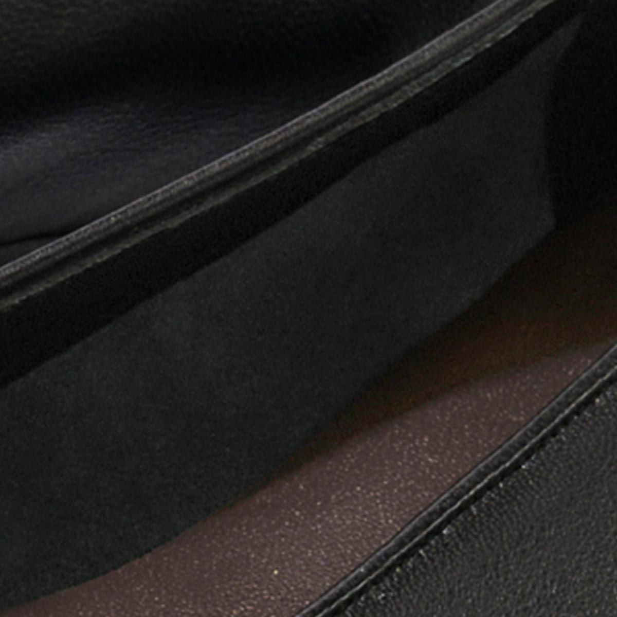 Close-up of The Salamanca - Black Nappa by Margaux, revealing its unlined interior, detailed stitching, and buttery soft leather texture.