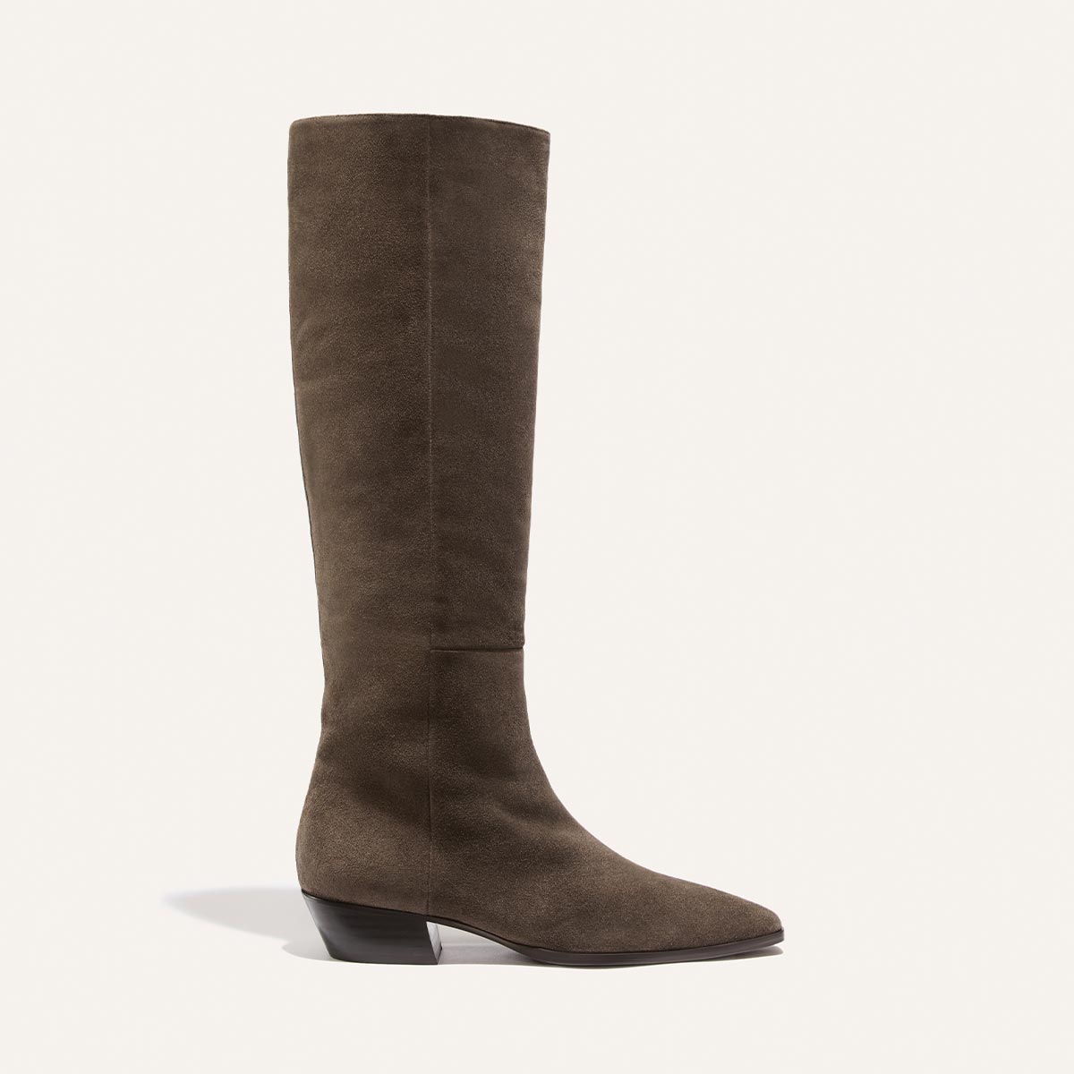 The Sierra Knee-High Boot by Margaux in English Brown Suede is shown as a single boot with a low black heel, set against a plain light background.