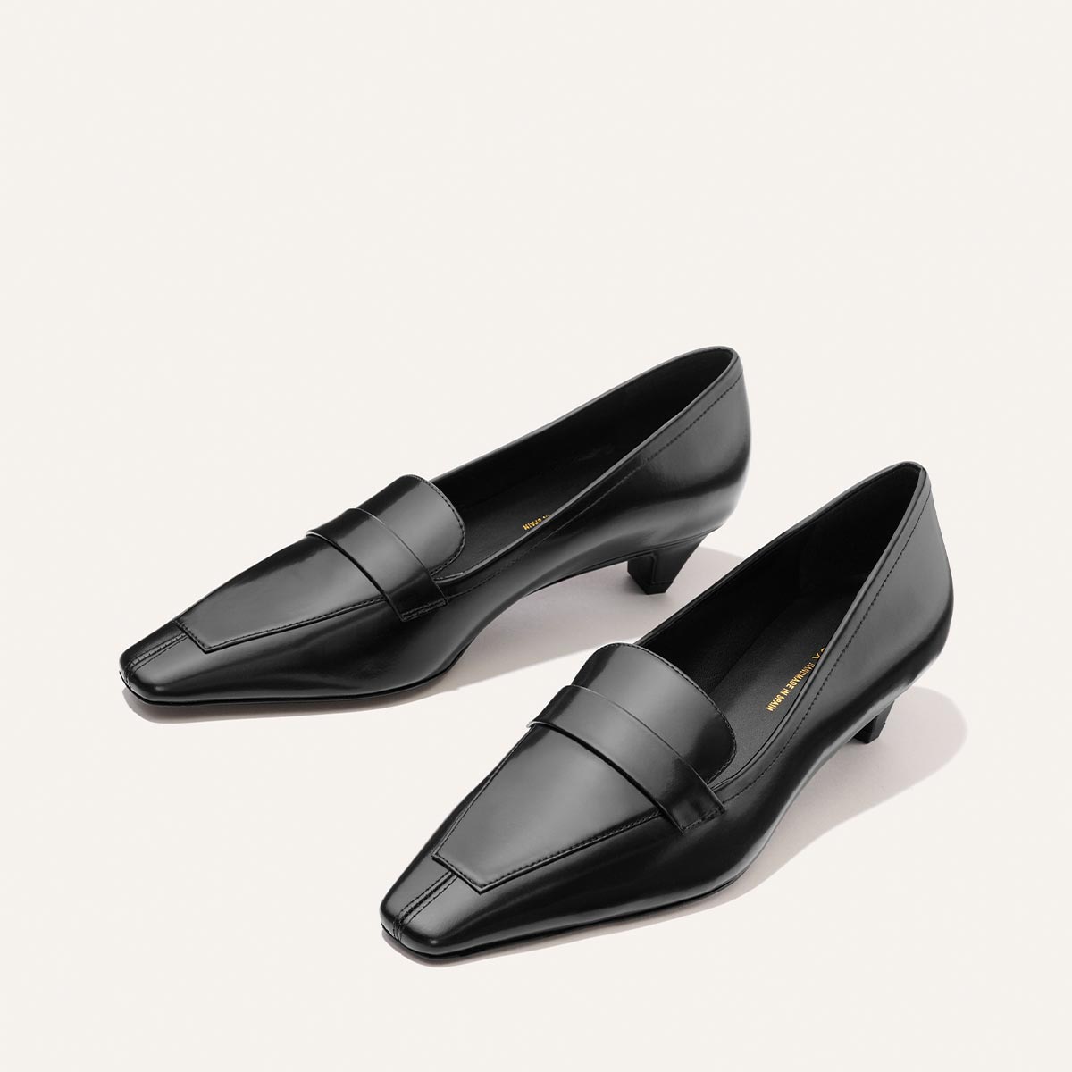 Margaux’s The Sigrid - Black Calf loafers in black leather with a square toe and a small kitten heel.