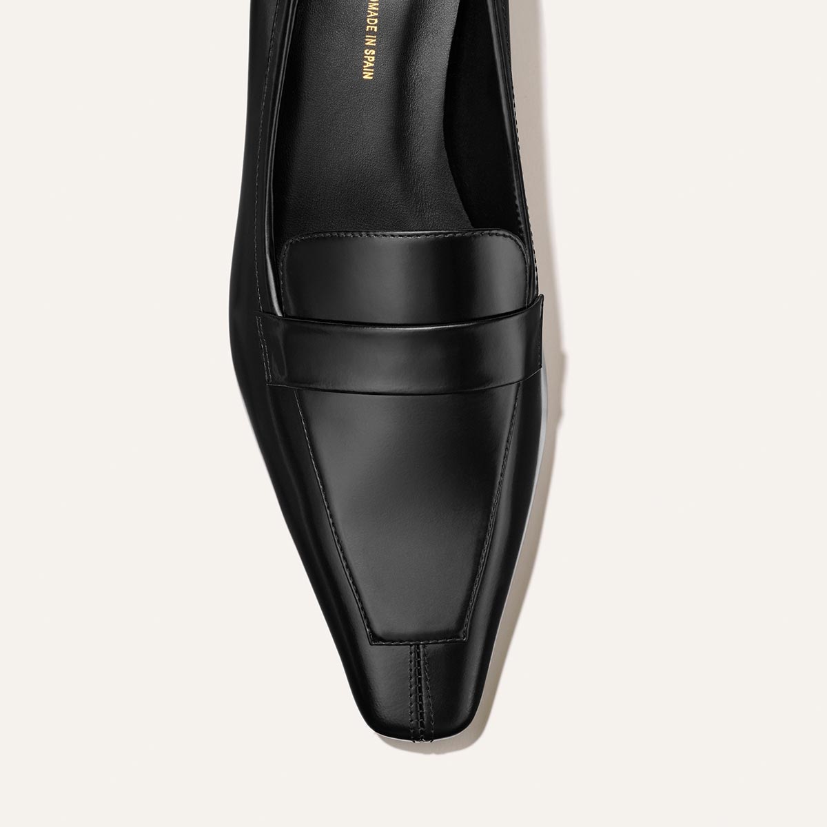 The Sigrid - Black Calf black leather square-toe loafer.