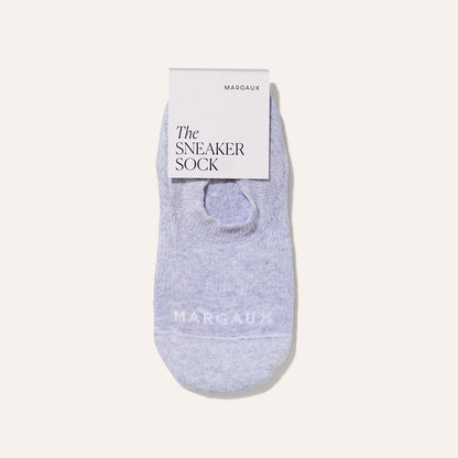 A single light purple cushioned no-show sock labeled Margaux The Sneaker Sock - Fog, displayed on a plain light background for all-day comfort.