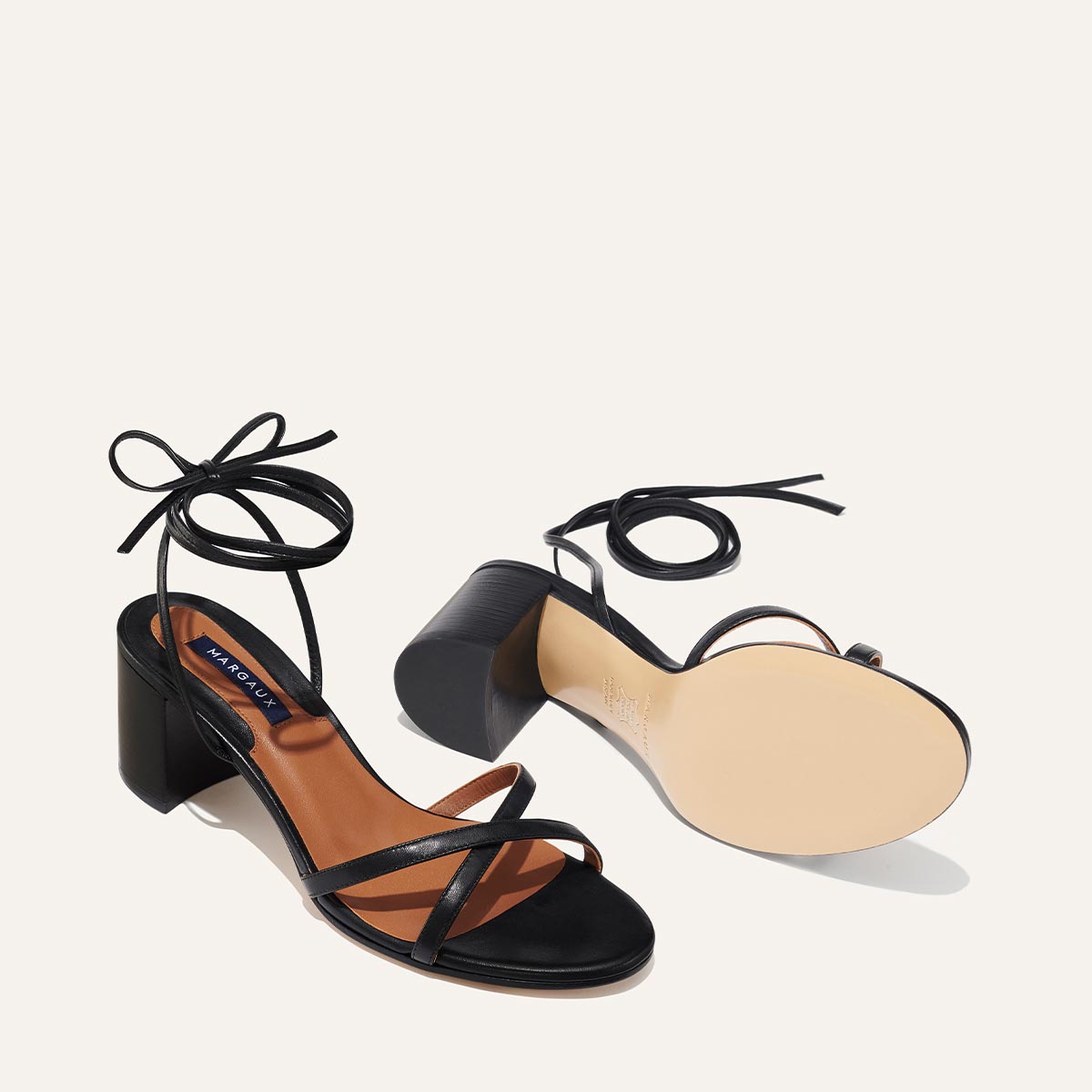 Sandals with heels and straps in black glossy leather | Jonak