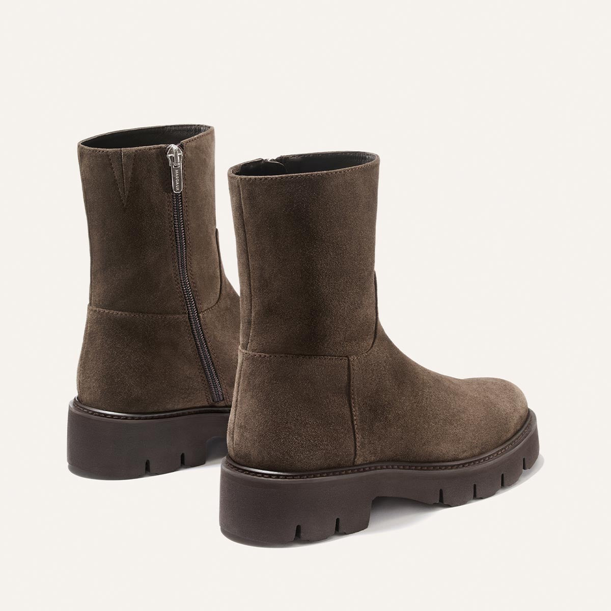 The Wells Boot - English Brown Suede ankle boot with a side zipper and a chunky lugged sole.
