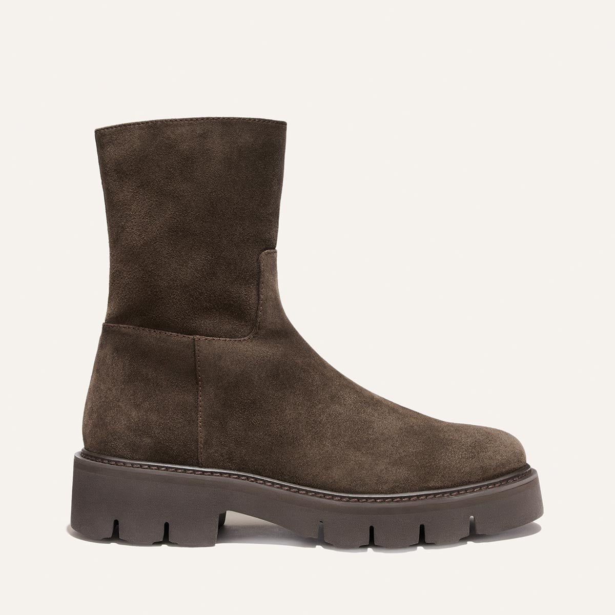The Wells Boot - English Brown Suede is a mid-calf boot in brown suede with a thick lugged sole.