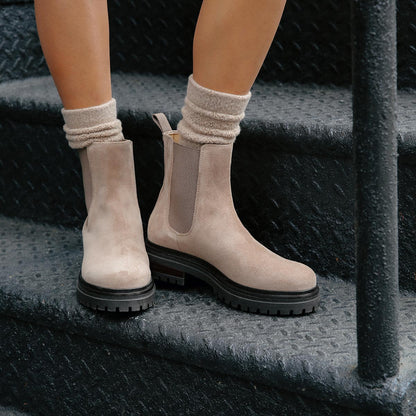 The West Chelsea Boot in Sandstone Suede, featuring water-resistant suede with a rubber lug sole for added traction and versatility.