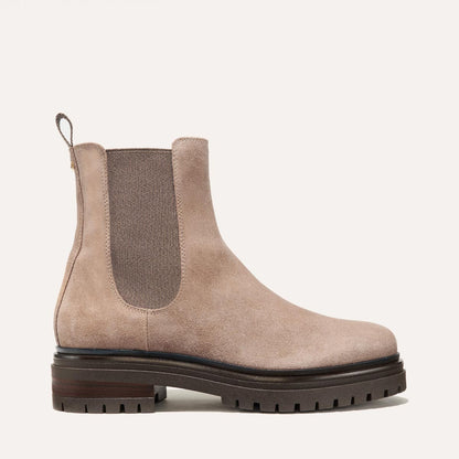 The West Chelsea Boot in Sandstone Suede, featuring water-resistant suede with a rubber lug sole for added traction and versatility.
