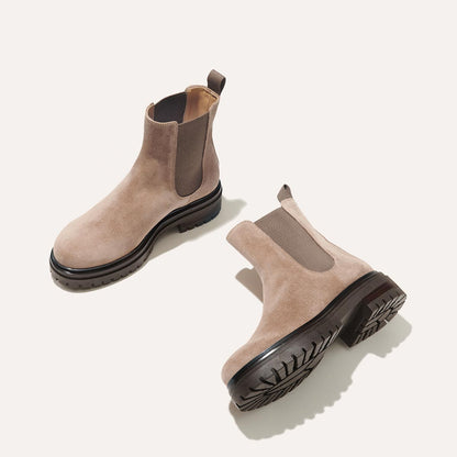 The West Chelsea Boot in Sandstone Suede, featuring water-resistant suede with a rubber lug sole for added traction and versatility.