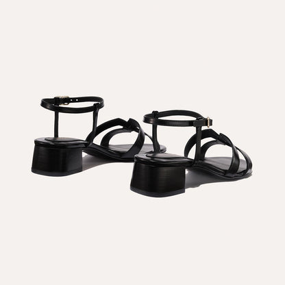 Low heeled sandals shown in black leather