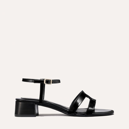Low heeled sandals shown in black leather