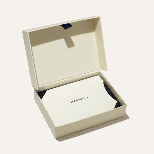 Margaux's physical gift card in luxe packaging for an elevated gift experience