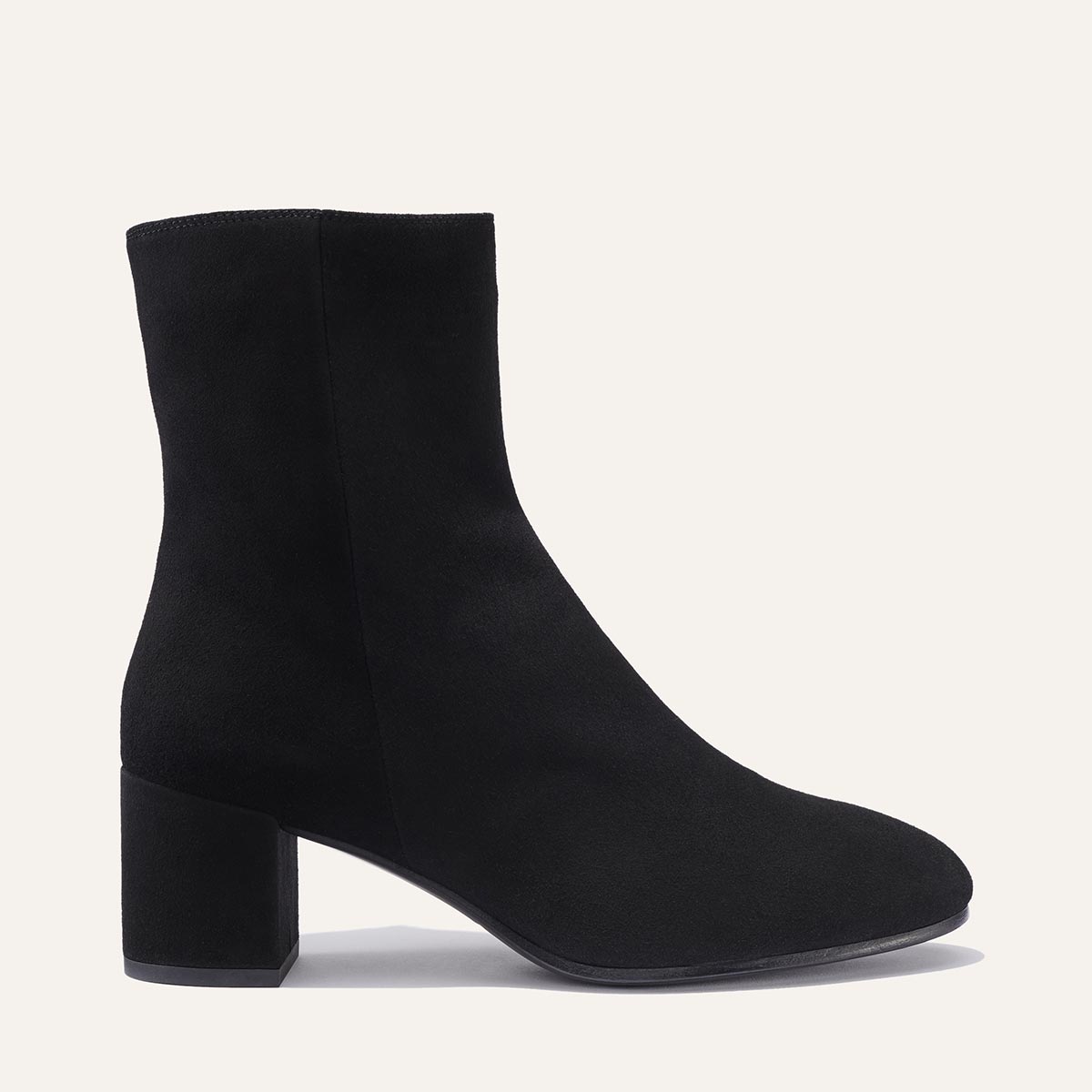 Margaux's classic ankle Boot in black suede with a comfortable block heel