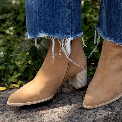The Downtown Boot in Sahara Suede, a chic ankle-height design complete with a Western-inspired welt and a comfortable 2.5-inch stacked heel.