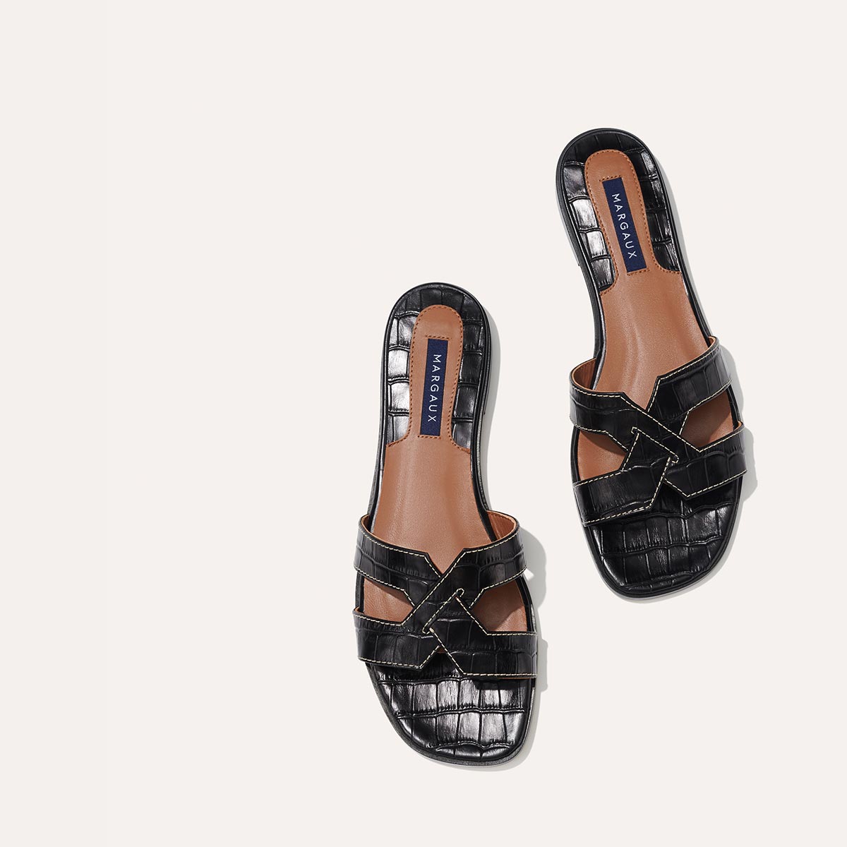 Black textured twin strap sandals – Dip Your Toes