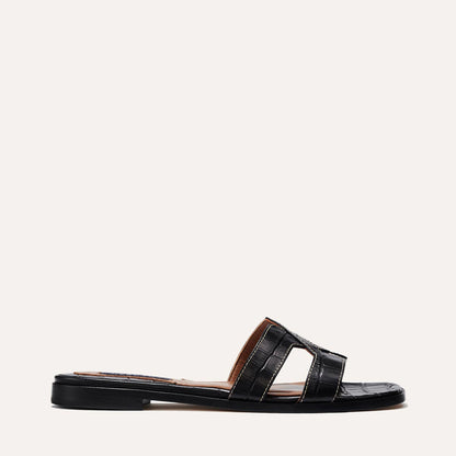 The MX Sandal in Black, a slip-on sandal featuring croc-embossed Italian calf leather with structured straps and a subtly square toe.