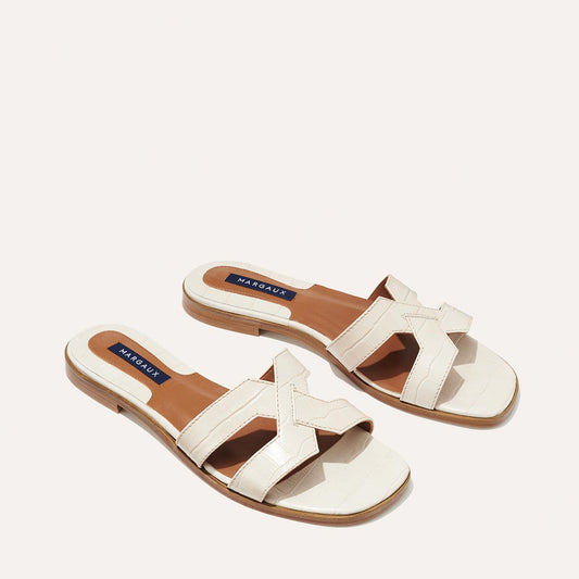 Margaux's classic and comfortable MX Sandal, made in Spain from ivory croc-embossed Italian leather