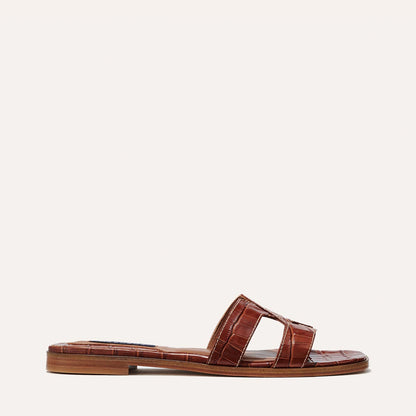 The MX Sandal in Mahogany, a slip-on sandal featuring croc-embossed Italian calf leather with structured straps and a subtly square toe.