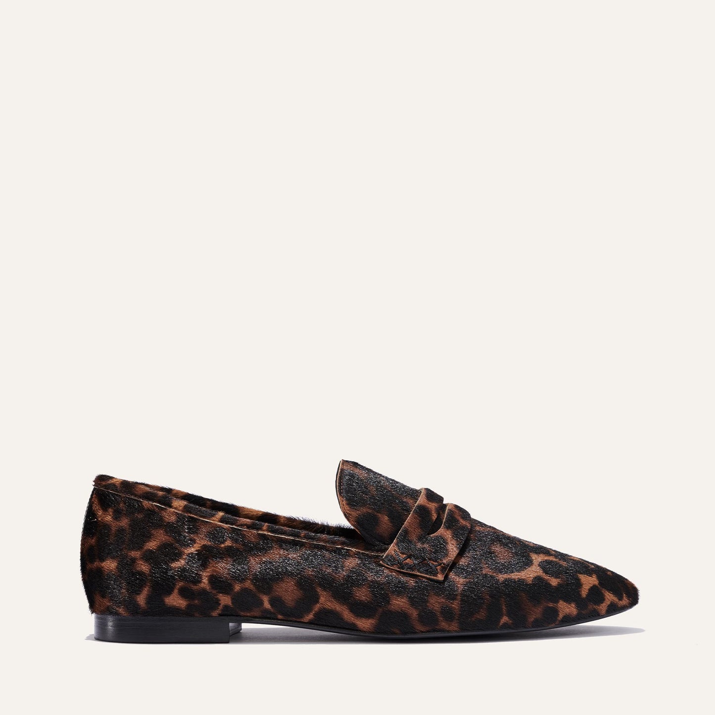 Margaux's classic and comfortable Penny loafer, made in a soft, chocolate leopard printed haircalf