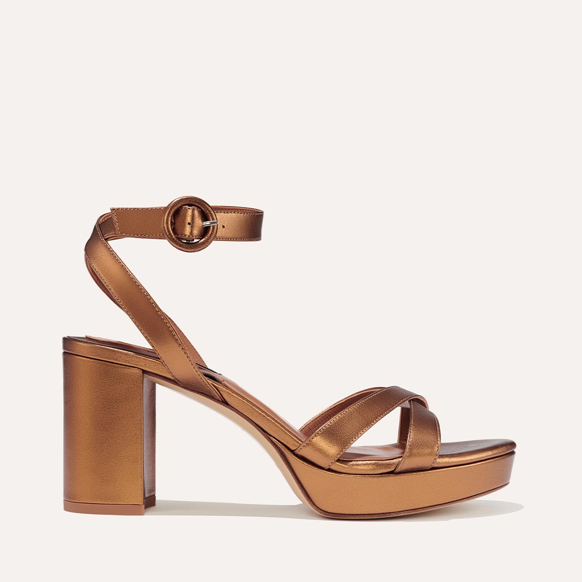 Margaux's classic and comfortable Platform Sandal in bronze metallic nappa leather with crossed straps and a walkable block heel