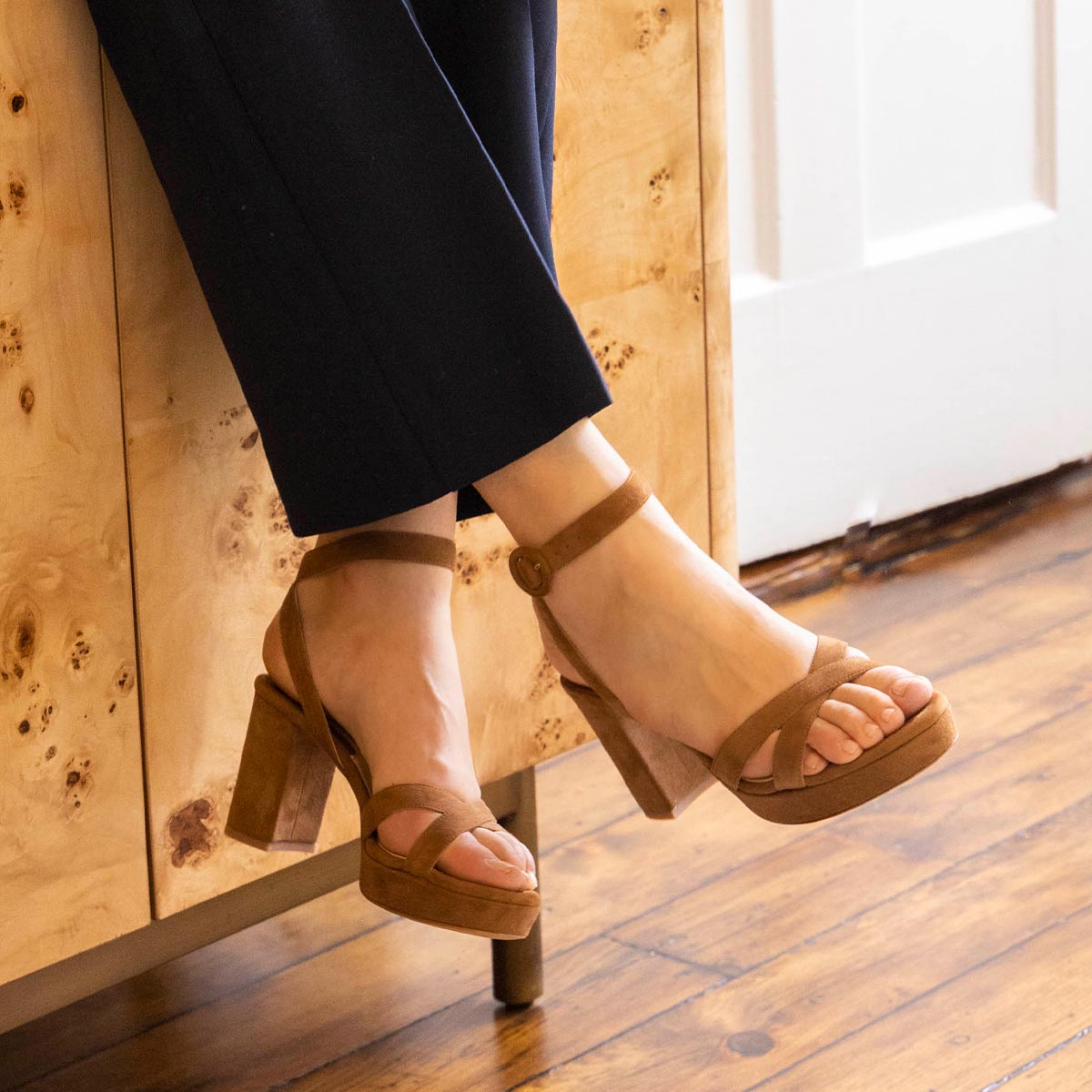 The Platform Sandal in Maple Suede, featuring a sleek ankle strap, perfectly placed straps across the toes and a comfortable 3.5-inch block heel.